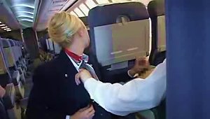 Naughty Flight Attendant Giving A